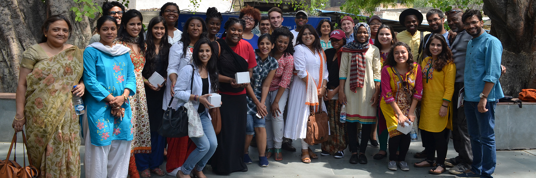 A group of study abroad participants pose together.